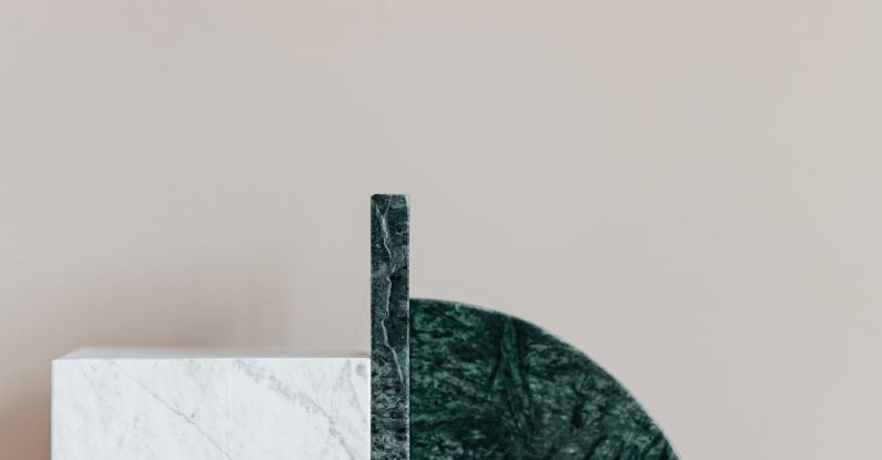 Elegant Space - Stylish green bookend on marble table