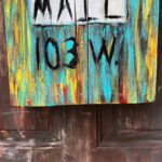 Distressed Look - Multi-coloured Wooden Mailbox Mounted On Door