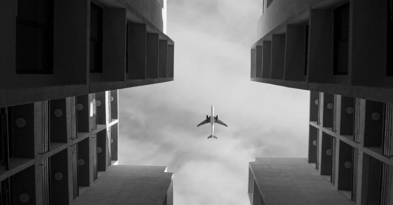 Multi-Functional Room - Grayscale Photo of Airplane