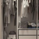 Closet - Assorted Clothes Hanged Inside Cabinet