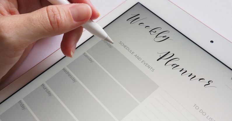 Schedule - Person Holding White Stylus