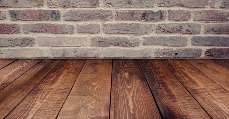 Flooring - Brown Wooden Panel Beside Concrete Board